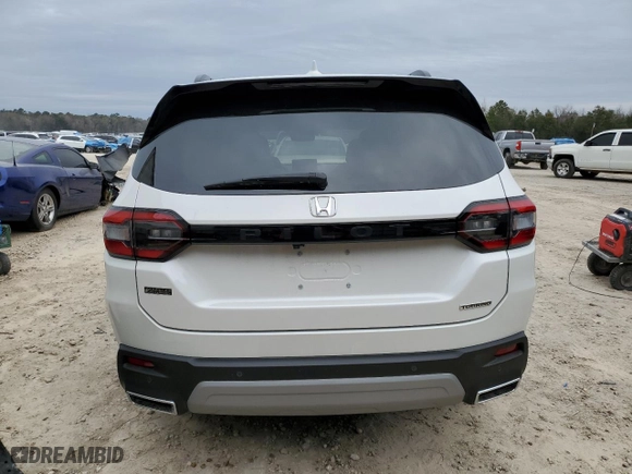 2025 Honda Pilot Touring with VIN 5FNYG2H76SB007454, listed as a Copart auction lot 88125485 with 10,065 mi miles and Salvage Title. Bid and sale history available at carsss.com. Image 6.