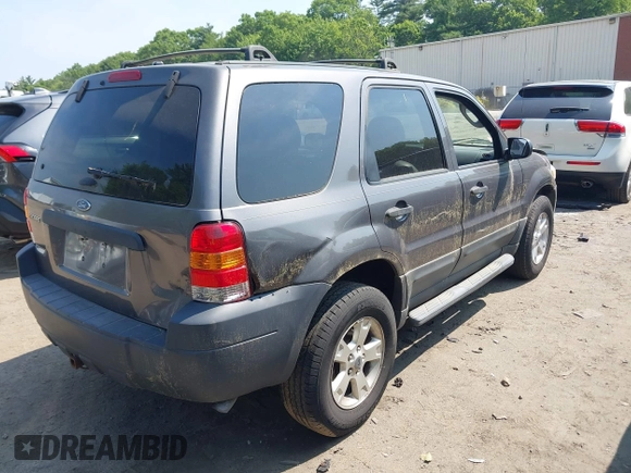 2005 Ford Escape XLT with VIN 1FMYU93155KA87661, listed as a IAAI auction lot 42491447 with 142,287 mi miles and . Bid and sale history available at DreamBid. Image 4.