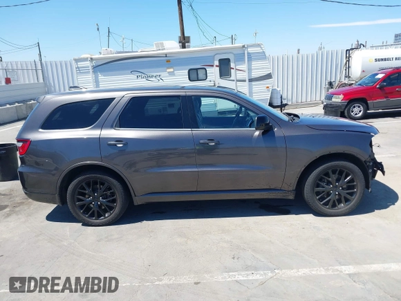 2015 Dodge Durango SXT with VIN 1C4RDHAG6FC750421, listed as a IAAI auction lot 42686052 with 142,744 mi miles and . Bid and sale history available at DreamBid. Image 14.