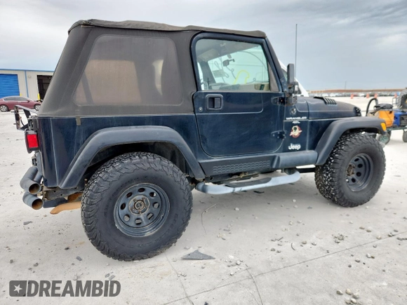 2000 Jeep Wrangler Sahara with VIN 1J4FA59S1YP777549, listed as a Copart auction lot 63622335 with 197,426 mi miles and Clean title. Bid and sale history available at DreamBid. Image 3.