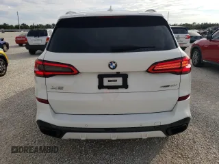 2020 BMW X5 sDrive40i with VIN 5UXCR4C02LLW63576, listed as a Copart auction lot 71912802 with 27,686 mi miles. Bid and sale history available at carsss.com. Image 6.