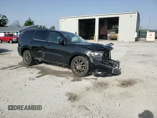 2018 Dodge Durango GT z VIN 1C4RDJDG8JC232130, wystawiony jako Copart lot #57096005 z przebiegiem 123 926 mil mil oraz Szkoda całkowita • Salvage title. Historia ofert i sprzedaży dostępna na DreamBid. Obrazek 14.