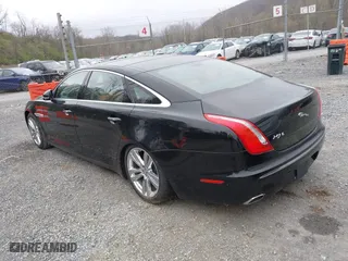 2012 Jaguar XJ with VIN SAJWA2GBXCLV32998, listed as a IAAI auction lot 41954979 with 1 mi miles. Bid and sale history available at carsss.com. Image 3.