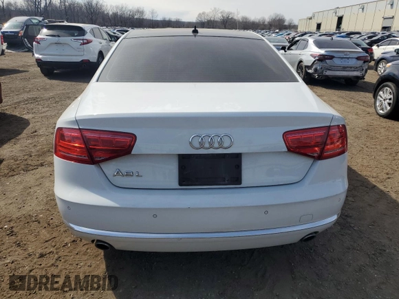 2014 Audi A8 3.0T z VIN WAURGAFD5EN007438, wystawiony jako Copart lot #47979945 z przebiegiem 147 236 mil mil oraz Szkody całkowita. Historia ofert i sprzedaży dostępna na DreamBid. Obrazek 6.