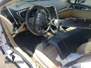 2015 Ford Fusion SE Hybrid z VIN 3FA6P0LU8FR105615, wystawiony jako Copart lot #61451155 z przebiegiem 106 778 mil mil oraz Szkoda całkowita • Salvage title. Historia ofert i sprzedaży dostępna na DreamBid. Obrazek 8.