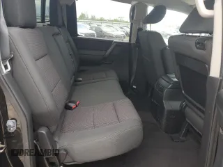 2012 Nissan Titan SV z VIN 1N6AA0EC0CN311288, wystawiony jako Copart lot #56845405 z przebiegiem 71 180 mil mil oraz Szkoda całkowita • Salvage title. Historia ofert i sprzedaży dostępna na DreamBid. Obrazek 10.