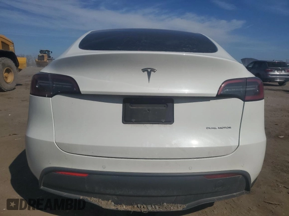2022 Tesla Model Y Long Range with VIN 7SAYGAEE3NF416838, listed as a Copart auction lot 46157675 with 24,254 mi miles and Salvage Title. Bid and sale history available at DreamBid. Image 6.