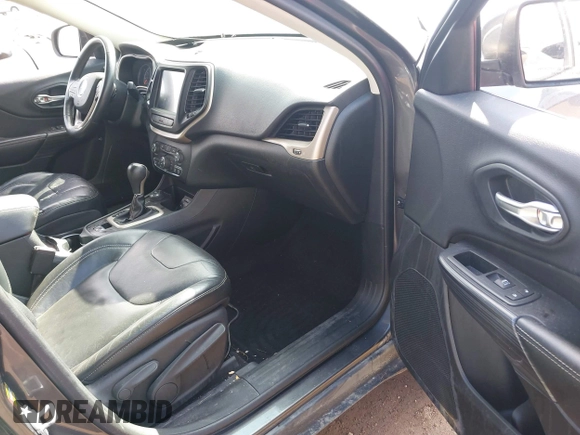 2015 Jeep Cherokee Limited with VIN 1C4PJMDB7FW591772, listed as a IAAI auction lot 41684106 with 118,708 mi miles and . Bid and sale history available at DreamBid. Image 5.