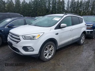 2018 Ford Escape SEL with VIN 1FMCU9HD5JUA42764, listed as a IAAI auction lot 41869026 with 84,958 mi miles. Bid and sale history available at carsss.com. Image 2.