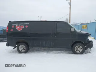 2018 Chevrolet Express Cargo Van with VIN 1GCWGAFP1J1267630, listed as a IAAI auction lot 41495213 with 79,238 mi miles. Bid and sale history available at carsss.com. Image 14.