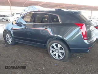 2014 Cadillac SRX Premium Collection z VIN 3GYFNDE31ES653114, wystawiony jako IAAI lot #42107858 z przebiegiem 125 192 mil mil oraz . Historia ofert i sprzedaży dostępna na DreamBid. Obrazek 3.