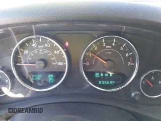 2018 Jeep Wrangler JK Unlimited Sport with VIN 1C4BJWDG9JL874850, listed as a IAAI auction lot 41482613 with 80,669 mi miles. Bid and sale history available at carsss.com. Image 7.
