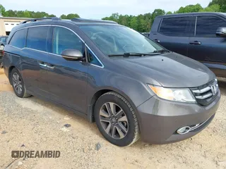 2015 Honda Odyssey Touring Elite с VIN 5FNRL5H97FB060981, выставлен на аукционе IAAI как лот 42289631 с пробегом 160 947 миль миль и . История ставок и продаж доступна на DreamBid. Изображение 1.