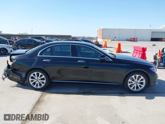 2018 Mercedes-Benz E 300 with VIN WDDZF4JB2JA351345, listed as a IAAI auction lot 41974757 with 53,948 mi miles and . Bid and sale history available at DreamBid. Image 14.