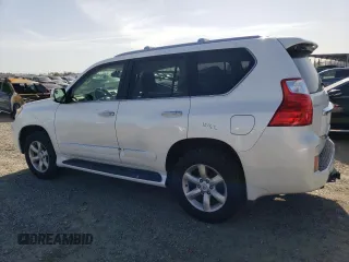 2010 Lexus GX 460 Premium with VIN JTJJM7FX6A5001418, listed as a Copart auction lot 52404285 with 169,065 mi miles and Salvage title. Bid and sale history available at DreamBid. Image 2.