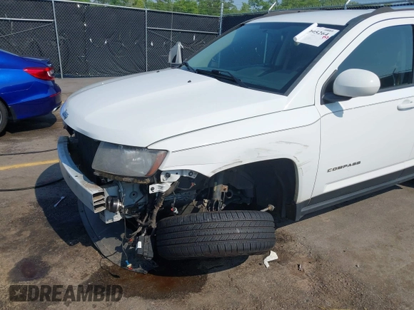2014 Jeep Compass Latitude with VIN 1C4NJCEB7ED794428, listed as a IAAI auction lot 41995264 with 182,413 mi miles. Bid and sale history available at carsss.com. Image 6.