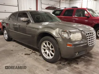 2010 Chrysler 300 Touring with VIN 2C3CA5CV9AH213299, listed as a IAAI auction lot 41754215 with 172,467 mi miles. Bid and sale history available at carsss.com. Image 1.