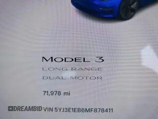 2021 Tesla Model 3 Long Range with VIN 5YJ3E1EB6MF878411, listed as a IAAI auction lot 41986947 with 71,978 mi miles and . Bid and sale history available at DreamBid. Image 7.