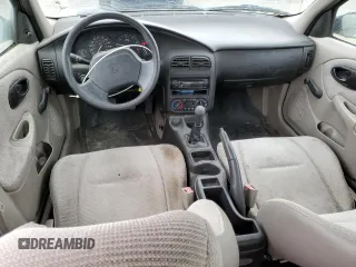 2001 Saturn SL with VIN 1G8ZF52891Z237485, listed as a Copart auction lot 76174574 with 130,525 mi miles and Salvage title. Bid and sale history available at DreamBid. Image 8.