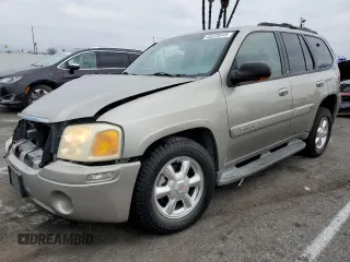 2003 GMC Envoy SLE with VIN 1GKDS13S232236886, listed as a Copart auction lot 43220545 with 58,229 mi miles and Salvage Title. Bid and sale history available at carsss.com. Image 1.