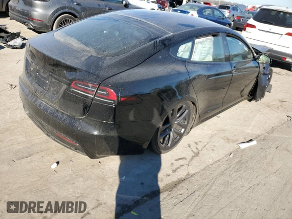 2023 Tesla Model S with VIN 5YJSA1E5XPF519570, listed as a Copart auction lot 80573863 with Not provided miles and Salvage title. Bid and sale history available at DreamBid. Image 3.