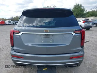 2020 Cadillac XT6 FWD Premium Luxury z VIN 1GYKPCRS9LZ129763, wystawiony jako IAAI lot #42052532 z przebiegiem 57 670 mil mil oraz . Historia ofert i sprzedaży dostępna na DreamBid. Obrazek 15.