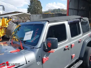 2018 Jeep Wrangler Unlimited Sport S with VIN 1C4HJXDG0JW250952, listed as a IAAI auction lot 41641476 with 117,284 mi miles. Bid and sale history available at carsss.com. Image 18.