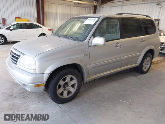 2003 Suzuki XL7 Touring z VIN JS3TX92V434101918, wystawiony jako IAAI lot #42750098 z przebiegiem 261 451 mil mil oraz . Historia ofert i sprzedaży dostępna na DreamBid. Obrazek 2.