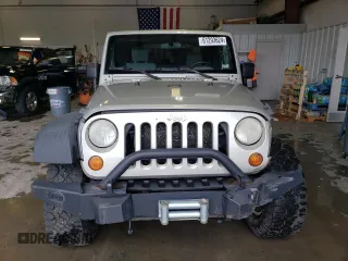 2007 Jeep Wrangler Rubicon z VIN 1J8GA64117L187431, wystawiony jako Copart lot #61293624 z przebiegiem 263 459 mil mil oraz Szkoda całkowita • Salvage title. Historia ofert i sprzedaży dostępna na DreamBid. Obrazek 5.