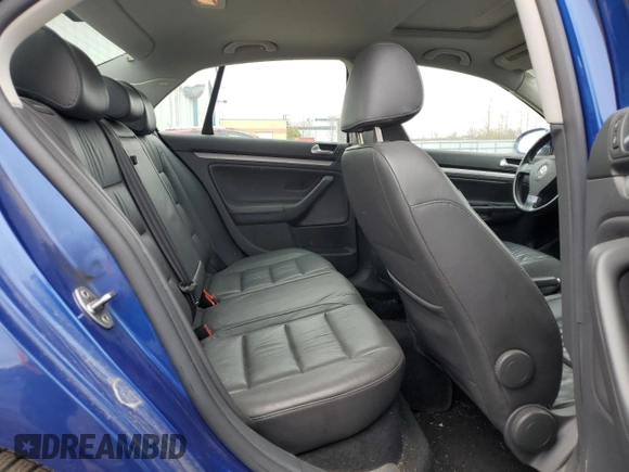 2008 Volkswagen Jetta z VIN 3VWRJ31K68M067231, wystawiony jako Copart lot #53196704 z przebiegiem 161 525 mil mil oraz Szkoda całkowita • Salvage title. Historia ofert i sprzedaży dostępna na DreamBid. Obrazek 10.