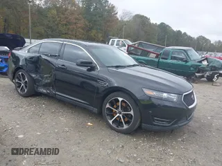 2015 Ford Taurus SHO with VIN 1FAHP2KT7FG148444, listed as a IAAI auction lot 40788614 with 121,533 mi miles and . Bid and sale history available at DreamBid. Image 1.