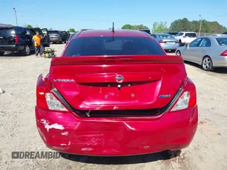 2014 Nissan Versa SV with VIN 3N1CN7AP3EL847465, listed as a IAAI auction lot 41988411 with 128,773 mi miles. Bid and sale history available at carsss.com. Image 6.