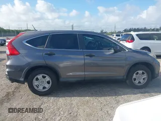 2015 Honda CR-V LX with VIN 2HKRM3H34FH510312, listed as a IAAI auction lot 41952816 with 111,712 mi miles and . Bid and sale history available at carsss.com. Image 14.