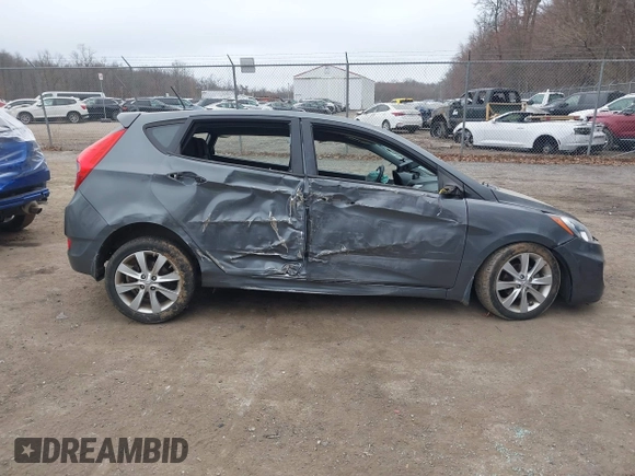2013 Hyundai Accent SE with VIN KMHCU5AE1DU091931, listed as a IAAI auction lot 41783034 with 72,732 mi miles. Bid and sale history available at carsss.com. Image 13.