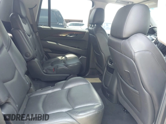 2020 Cadillac Escalade Luxury z VIN 1GYS3BKJ0LR116410, wystawiony jako IAAI lot #42274841 z przebiegiem 75 513 mil mil oraz . Historia ofert i sprzedaży dostępna na DreamBid. Obrazek 8.