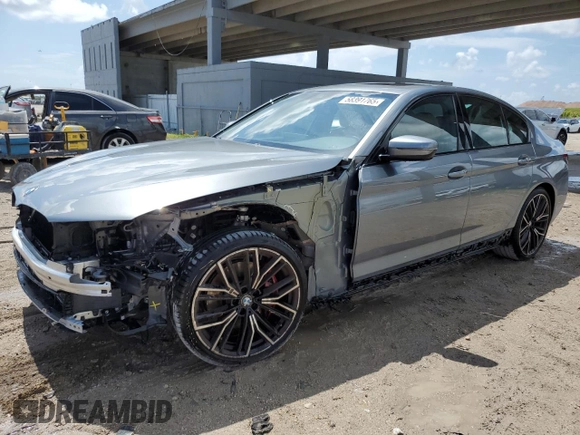 2023 BMW 5 Series 530i with VIN WBA53BH02PCM55841, listed as a Copart auction lot 58391765 with 6,947 mi miles and Salvage title. Bid and sale history available at DreamBid. Image 1.