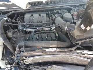 2015 Ford Taurus SEL z VIN 1FAHP2E86FG203425, wystawiony jako Copart lot #52261295 z przebiegiem 78 575 mil mil oraz Szkoda całkowita • Salvage title. Historia ofert i sprzedaży dostępna na DreamBid. Obrazek 11.