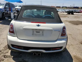 2011 MINI Convertible S with VIN WMWZP3C51BTX83131, listed as a Copart auction lot 57136355 with 118,364 mi miles and Clean Title. Bid and sale history available at DreamBid. Image 6.