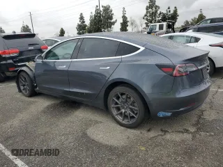 2019 Tesla Model 3 Mid Range with VIN 5YJ3E1EA9KF447453, listed as a Copart auction lot 48967605 with 72,031 mi miles and Salvage Title. Bid and sale history available at DreamBid. Image 2.
