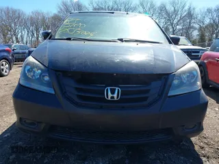 2009 Honda Odyssey EX-L with VIN 5FNRL38759B055396, listed as a IAAI auction lot 41863703 with 999,999 mi miles. Bid and sale history available at carsss.com. Image 6.