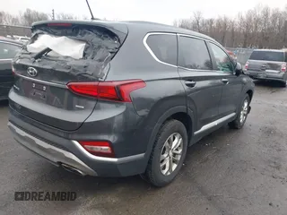 2020 Hyundai Santa Fe SE with VIN 5NMS2CAD8LH258275, listed as a IAAI auction lot 41912687 with 80,467 mi miles and . Bid and sale history available at DreamBid. Image 4.