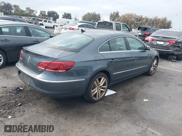 2013 Volkswagen CC Lux with VIN WVWRP7AN8DE507811, listed as a IAAI auction lot 41447468 with 147,162 mi miles. Bid and sale history available at carsss.com. Image 4.