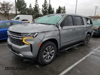 2023 Chevrolet Suburban LT with VIN 1GNSCCKDXPR401733, listed as a Copart auction lot 82693534 with 15,369 mi miles and Salvage Title. Bid and sale history available at DreamBid. Image 1.