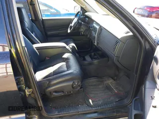 2003 Dodge Durango SLT Plus z VIN 1D4HS58N93F612762, wystawiony jako IAAI lot #42366451 z przebiegiem 194 677 mil mil oraz . Historia ofert i sprzedaży dostępna na DreamBid. Obrazek 5.