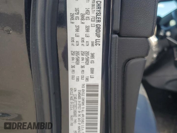2014 Jeep Grand Cherokee Overland with VIN 1C4RJFCT2EC106002, listed as a Copart auction lot 48763675 with 143,011 mi miles and Salvage Title. Bid and sale history available at DreamBid. Image 13.