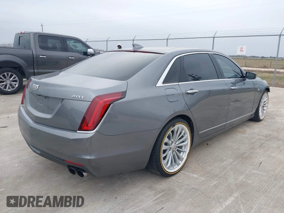 2018 Cadillac CT6 Luxury RWD z VIN 1G6KC5RX4JU159789, wystawiony jako IAAI lot #41145010 z przebiegiem 73 811 mil mil oraz . Historia ofert i sprzedaży dostępna na DreamBid. Obrazek 4.