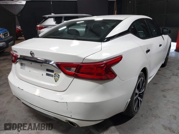 2018 Nissan Maxima SV with VIN 1N4AA6AP7JC406251, listed as a IAAI auction lot 41786523 with 117,403 mi miles and . Bid and sale history available at DreamBid. Image 4.