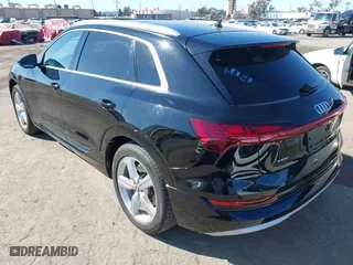 2019 Audi e-tron Premium Plus with VIN WA1LAAGE9KB021724, listed as a IAAI auction lot 41643596 with 34,804 mi miles. Bid and sale history available at carsss.com. Image 3.