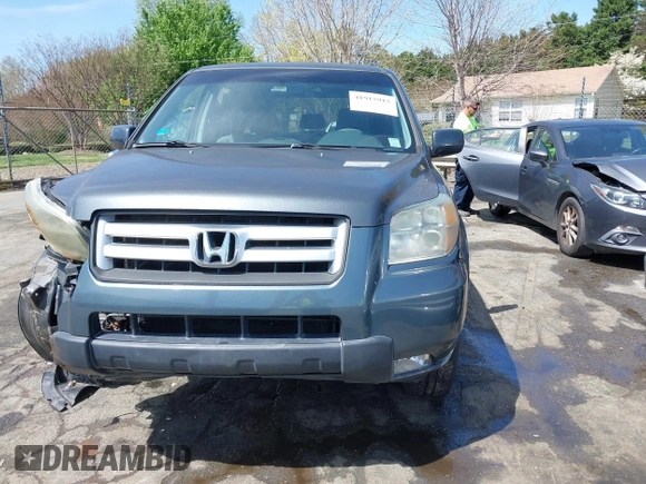 2006 Honda Pilot EX with VIN 2HKYF18416H529290, listed as a IAAI auction lot 41915915 with 135,385 mi miles and . Bid and sale history available at DreamBid. Image 12.