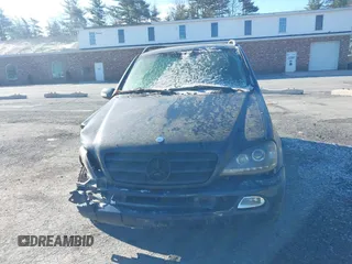 2003 Mercedes-Benz M 3.7L with VIN 4JGAB57E23A450868, listed as a IAAI auction lot 41983681 with 125,468 mi miles. Bid and sale history available at carsss.com. Image 11.